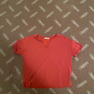 A mix of red and pink color, short sleeve shirt